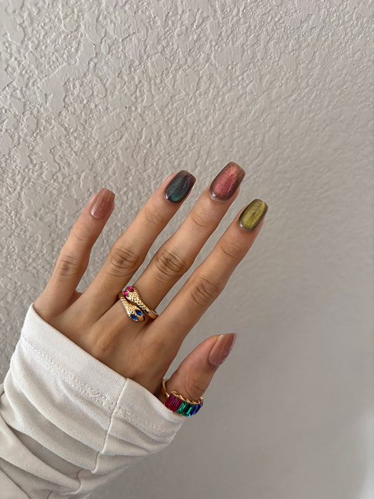 Colorful cat eye glitter nails, nude, blue, red, green glitter colors